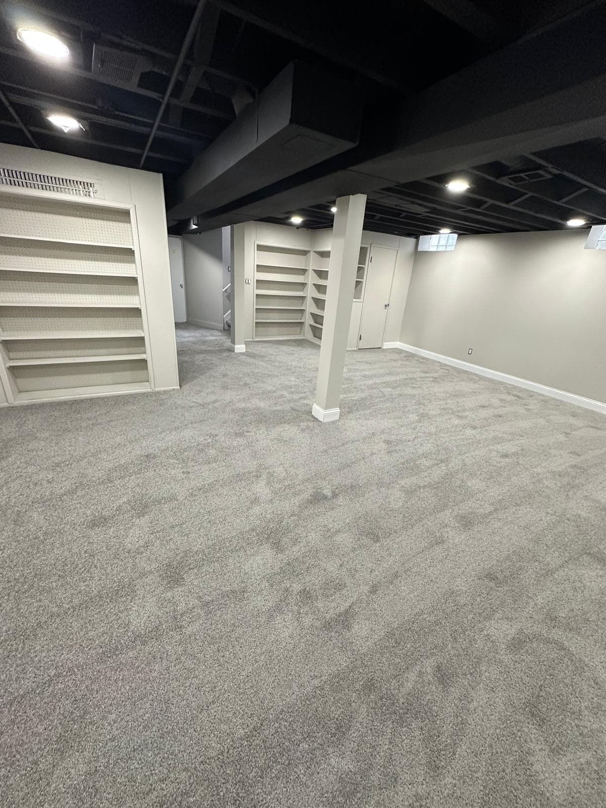Premium basement carpet installation in Romulus MI area home by Paradise Floors